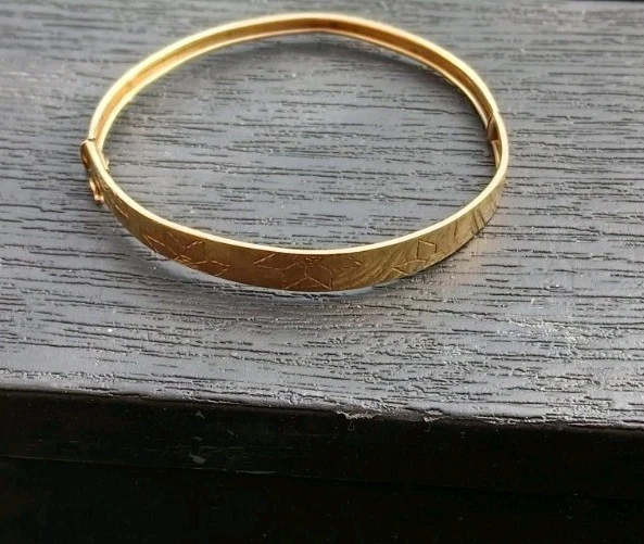 A 9 carat* gold plain bangle main image 1