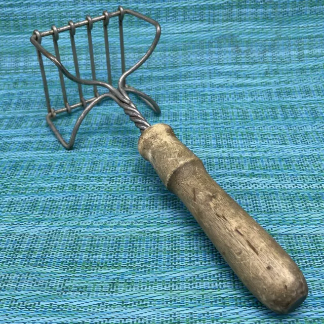 https://www.picclickimg.com/XWcAAOSw279k5Dm8/Vintage-Square-Twisted-Wire-Potato-Masher-Wood-Handle.webp