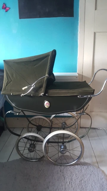 Green silver hotsell cross dolls pram