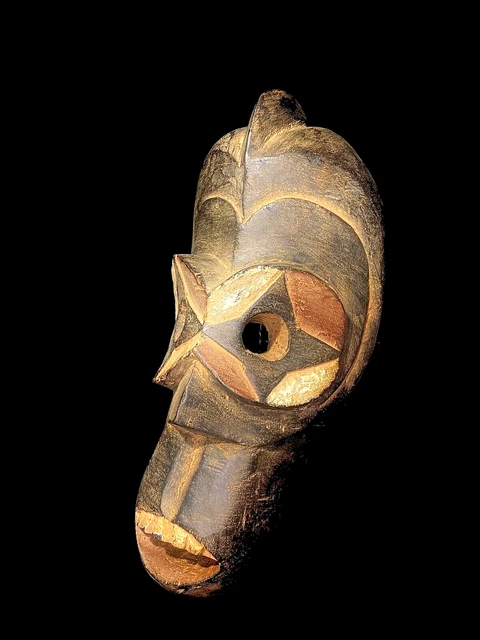 Maschera africana antica intagliata a mano in legno da parete con...