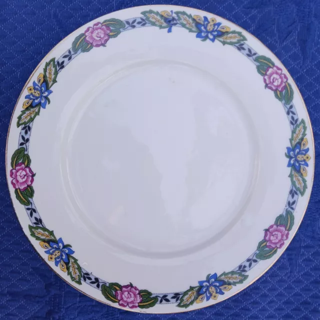 Ancien joli plat à gâteau / tarte sur piedouche en porcelaine décor