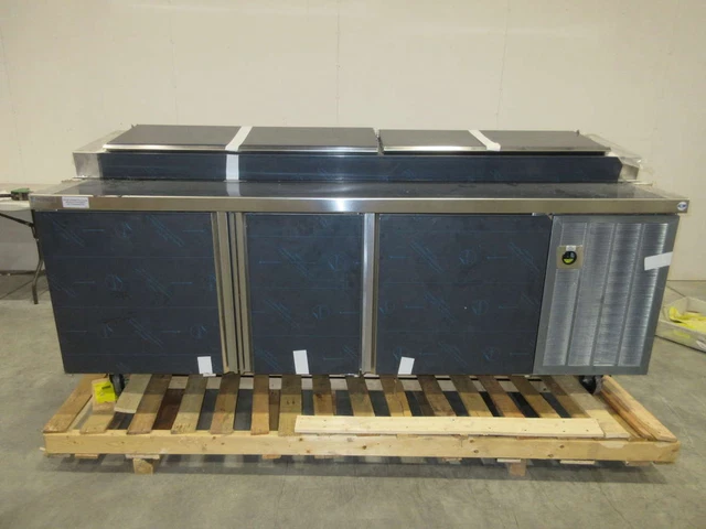 Delfield 91" 22.82 Cu. Ft. Capacity 3 Solid Door Refrigerated Pizza Prep Table