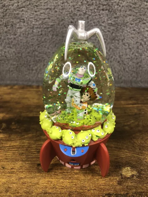 Disney TOY STORY Snow Globe Pizza Planet Rocket Claw Machine,Buzz,Woody,Aliens.