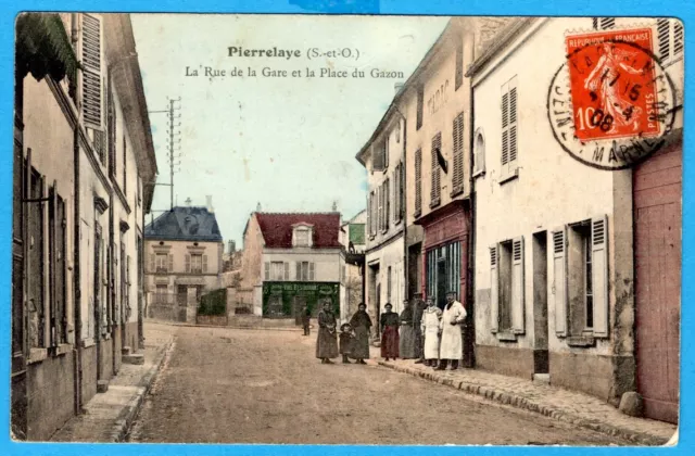 Cpa 95 Pierrelaye - La Rue De La Gare Et La Place Du Gazon