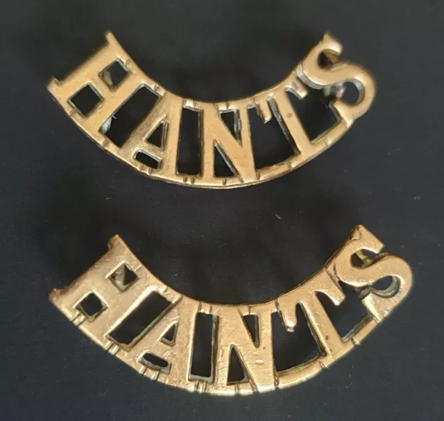 A Pair of Hampshire Regiment Brass Shoulder Titles. Hants