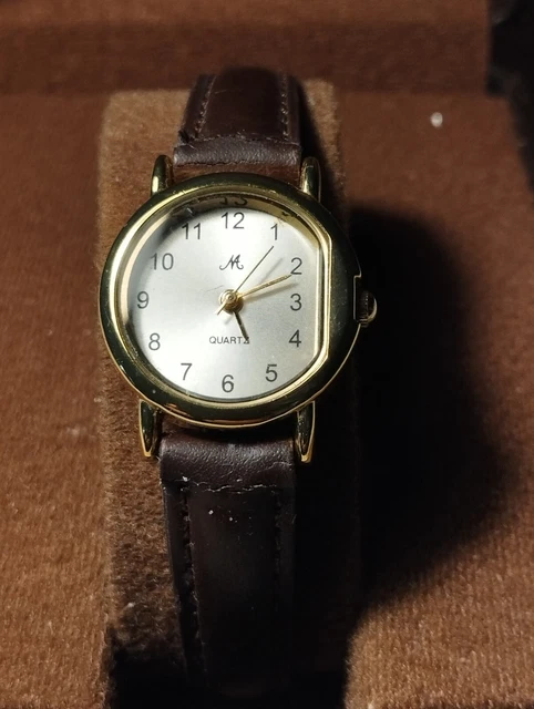 Montre Femme Huihua Tank – Quartz, Boîtier Doré, Bracelet Cuir Bleu – Occasion Bon état