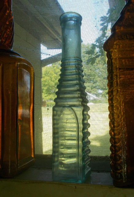 16 RING SQUARE PEPPERSAUCE BOTTLE WITH SUNKEN ARCHED PANEL DUG IN 1880s PRIVY