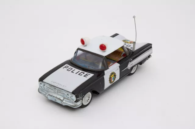 Tin Toy police car Blechspielzeug Polizeiauto Chevrolet Vintage