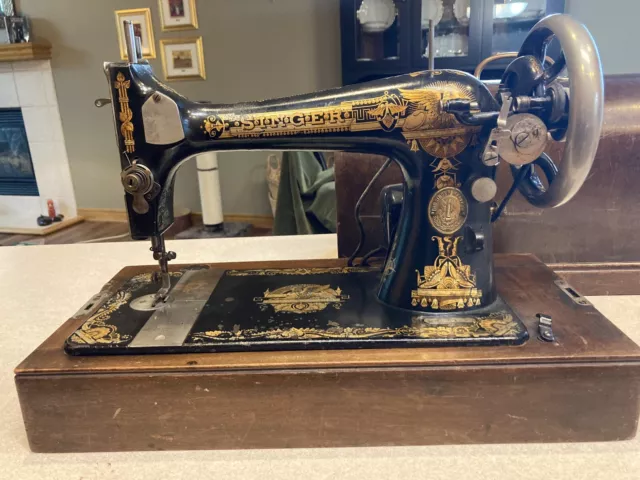 1901 Singer Sphinx Sewing  Machine with Case And a Lot of Original Accessories.