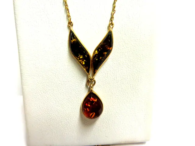 14kt yellow gold amber necklace sz 18in lg wgt 4.4 grams 3pc amber y shape