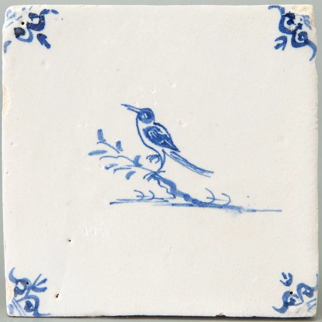 Nice Dutch Delft Blue animal tile, bird on a branch, 17th century.
