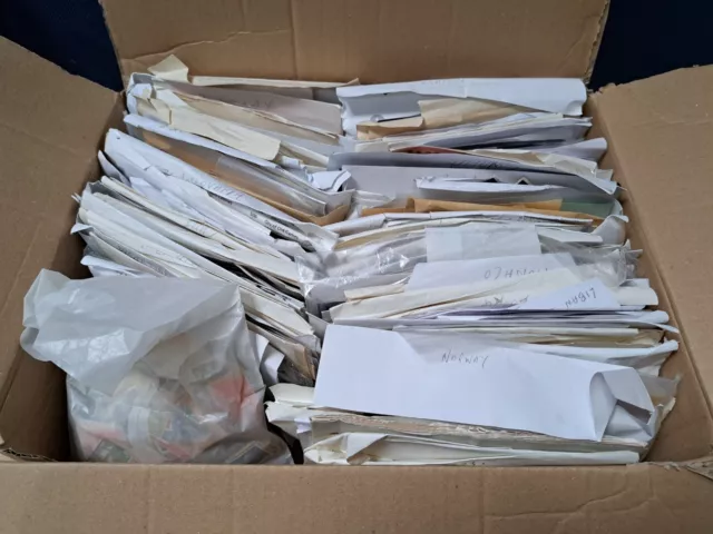 Box Containing Individual Packets Of Many Countries Off Paper Stamps