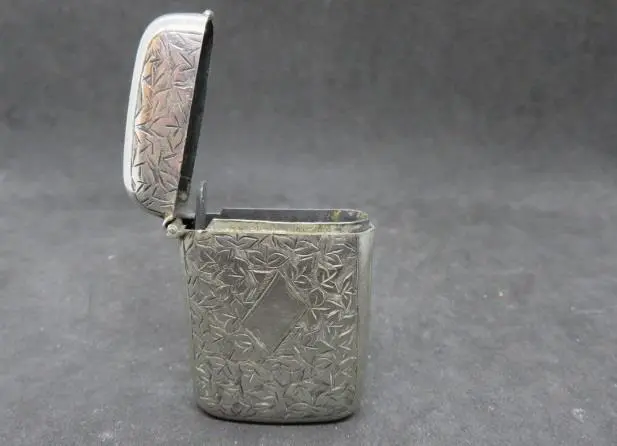 English Sterling Silver Match Safe with Ornate Floral Design and Striker