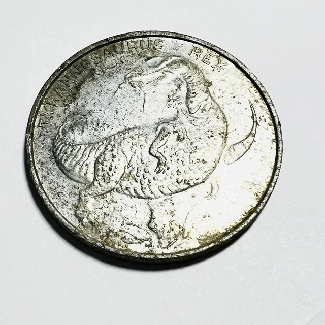 tyrannosaurus-t-rex-dinosaur-family-tree-medal-coin-token-stegosaurus