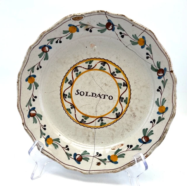 Sold Price: NEVERS - Assiette en faïence de forme chantournée à décor polychrome dit