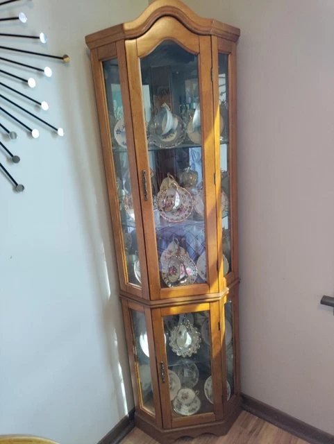 2 piece Corner Curio Oak Colored Cabinet with 20 sets of cups and saucers