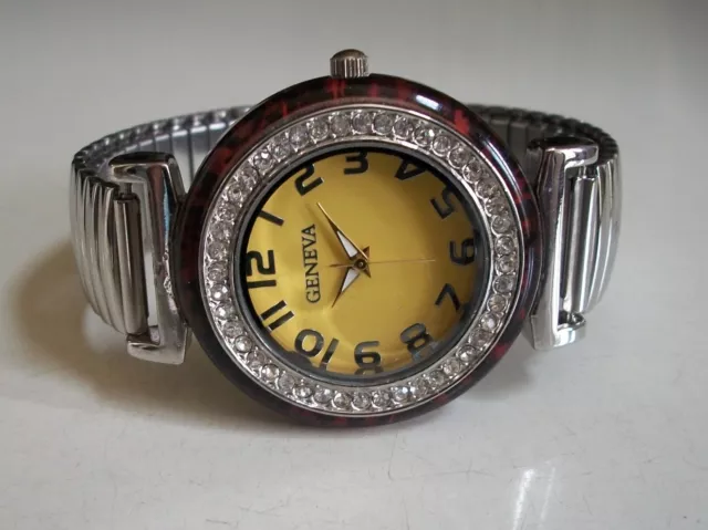Women's stone stretch band silver finish yellow number dial fashion casual watch