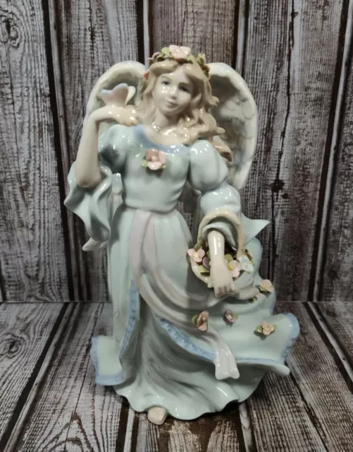 Cosmos 1461 Fine Porcelain Angel w Flower Basket and Butterfly Musical Figurine