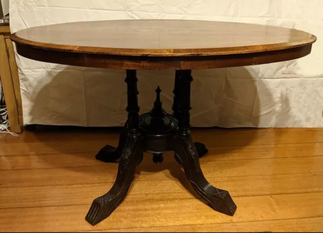 Antique Victorian walnut oval occasional table with marquetry central motif 