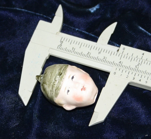 Antique bisque porcelain doll head for dollhouse doll or collage