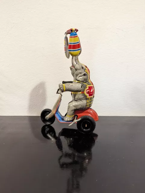 Elefant auf Dreirad Fahne - Mechanisches Blechspielzeug Wind-Up-Toy - Vintage