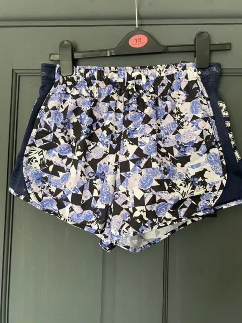 Pantaloncini da ragazza Nike Dry Fit XL viola rosa floreale blu navy