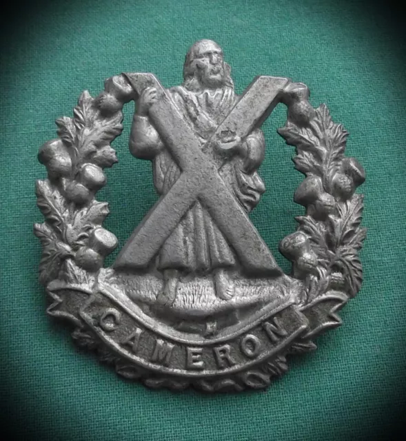 The Cameron Highlanders ~ 100% Genuine, British Army Military Cap Badge.