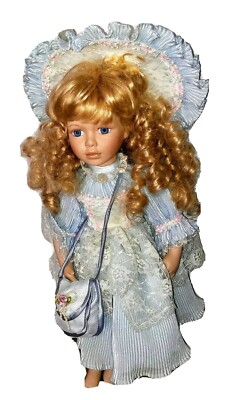 Doll.  Bisque.  Blonde Curly Hair.  Tall.