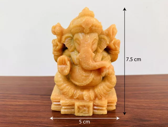 Orange Ganesha stone statue Lord Hindu Elephant God of Success Ganesh Meditation