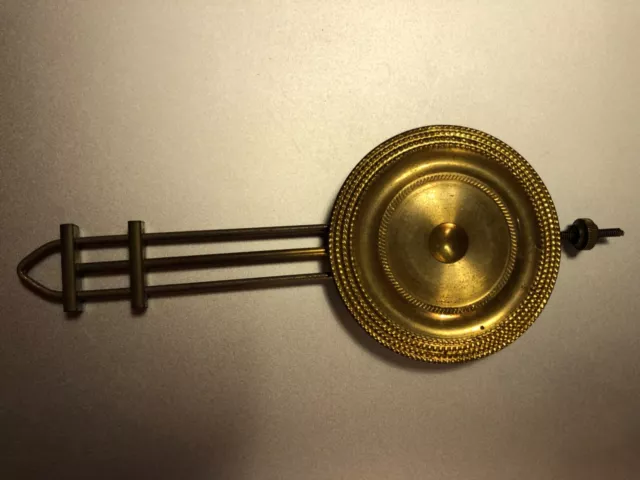 1 used shelf or mantle clock pendulum, brass, length 15cm, bob diameter is 6cm