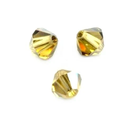 25 Perles Toupies 4mm cristal Swarovski - LIGHT TOPAZ SATIN