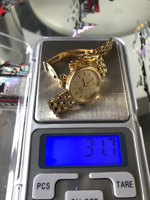 Montre ancienne femme tissot or jaune online