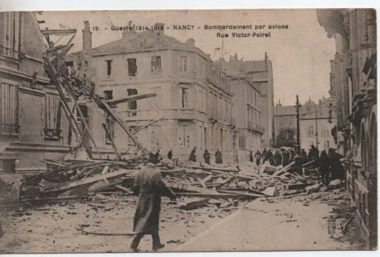 CPA - NANCY  - Bombardement par avions Rue Victor-Poirel - Guerre 14-18 - (1924)