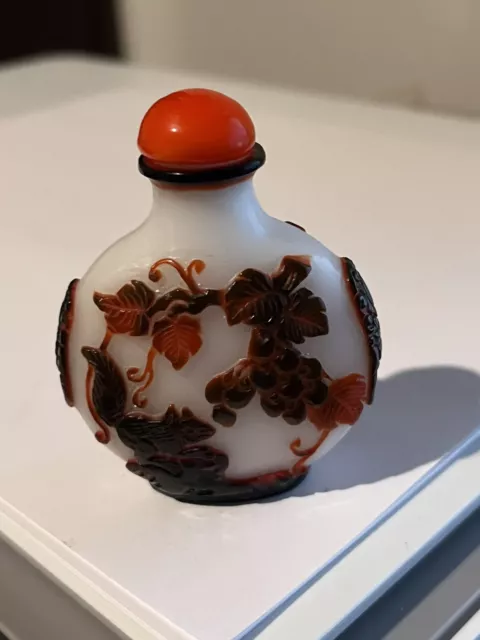 Chinese Carved Peking Glass Snuff Bottle 2.5" Tall 2.0" Wide 1.00" Deep