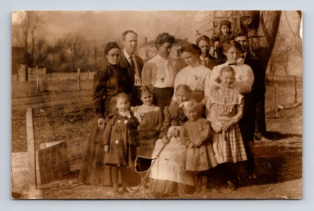 RPPC Family Portrait at Farm Home First Names Listed Unknown Real Photo Postcard