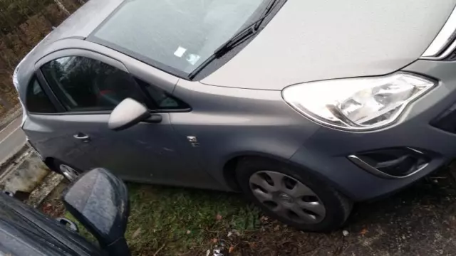 Interrupteur de leve vitre avant gauche OPEL CORSA D 13258522