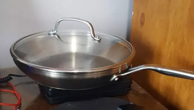 https://www.picclickimg.com/Y6oAAOSwG6VkCgjN/KitchenAid-11-in-Covered-Fry-Pan-Tri-Ply-Stainless.webp