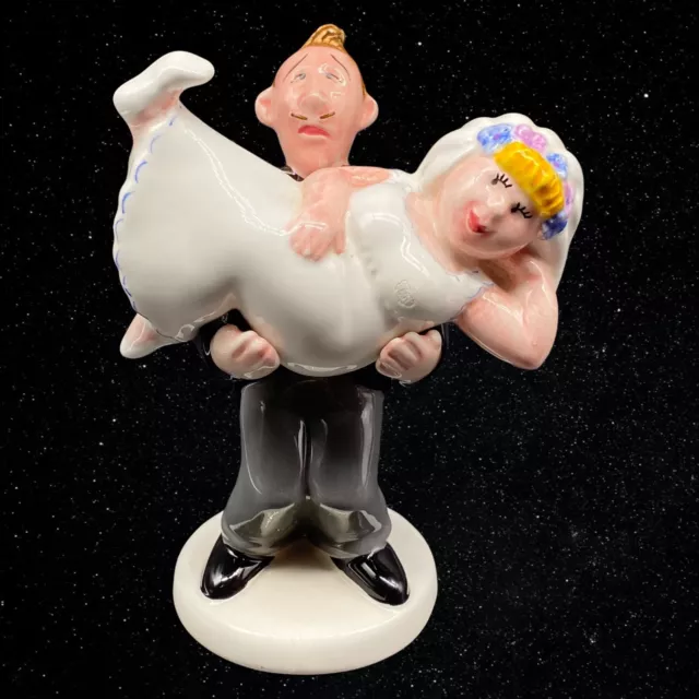 https://www.picclickimg.com/Y74AAOSw0kNiaw4I/Clay-Art-BRIDE-AND-GROOM-OVER-THE-THRESHOLD.webp