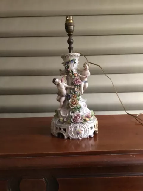 Dresden porcelain figural lamp base with two putti. 