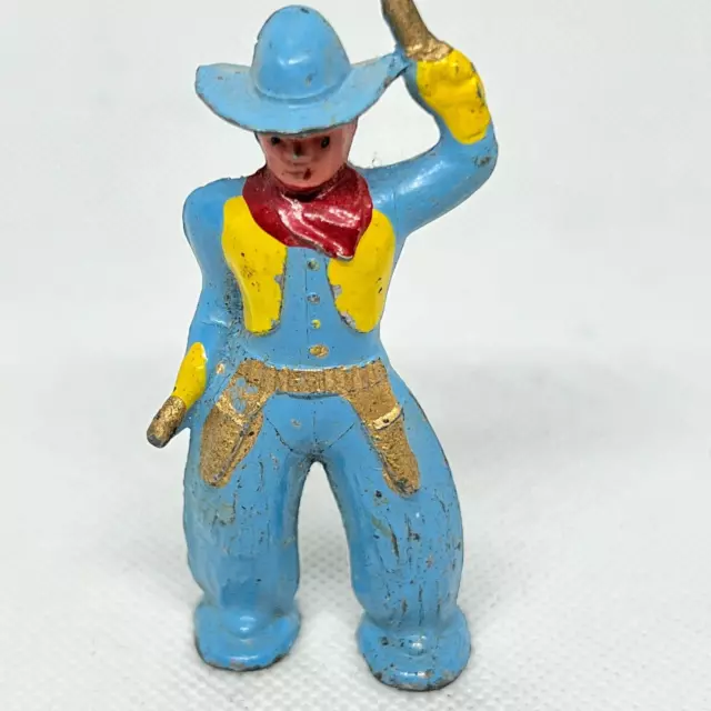 Vintage Cast Iron Cowboy Figurine 3" Tall Yellow vest Blue Pants & shirt