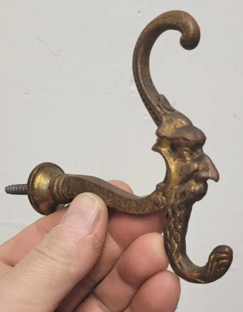 Pair of ANTIQUE BRASS NORTHWIND HAT COAT HOOKS CURTAIN TIE BACK OLD MAN FACE