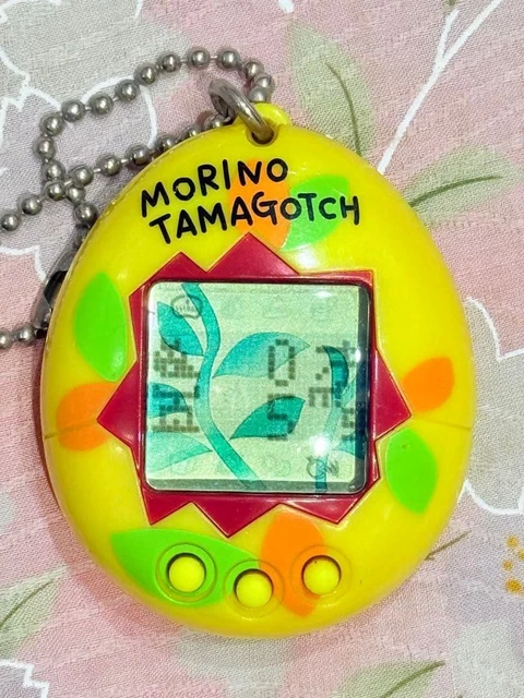 RakuRaku Dinokun Dinkie Dino Pocket Game Virtual Pet white