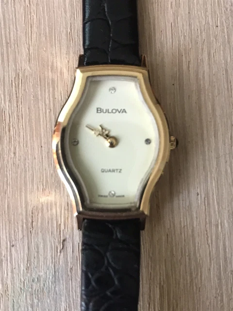 Montre Bulova 72003 Mécanique Plaquée Or - Cadran Noir Et Or, Unisexe Vintage Années 70