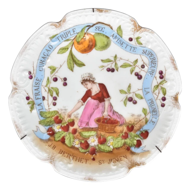 Assiette en céramique peinte XIXème à la cueilleuse de fruits