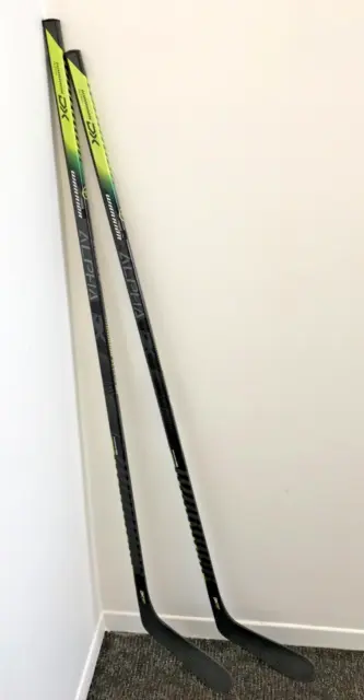 Warrior Alpha DX Grip Composite Intermediate Ice Hockey Sticks (2). Left Hand.