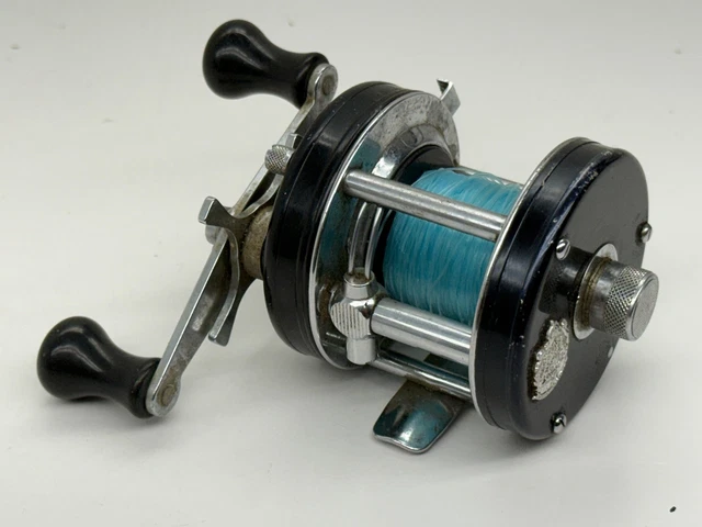 baitcasting reel made from mcdonalds A&S PC-7000 Baitcast with fancy cork knobs Daiwa Luna 253 Round Profile
