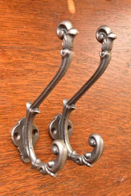 A pair of ornate vine antique style cast iron coat hook double coathook O1