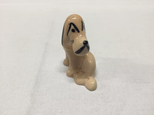 Vintage Sitting Sad Hound Dog Ceramic Figurine Brown and Black Hand Painted