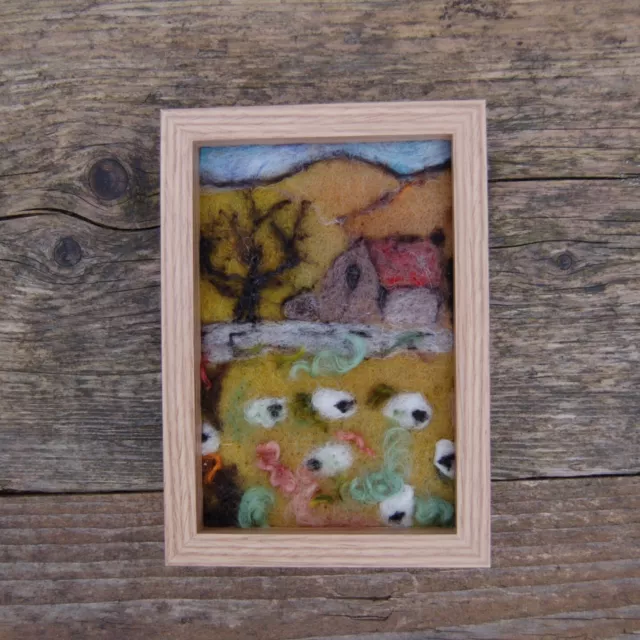 Textile Art Needle Felted Picture sheep in the Meadow by a building