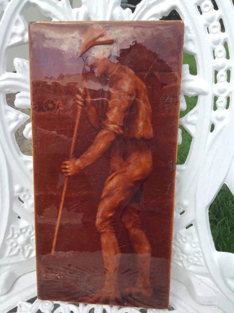 Antique Victorian Brown Glazed Moulded Majolica Tile Of A Farm Hand Haymaking